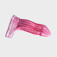 A Thick cock sleeve called the Bad Dragon.