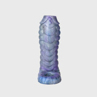 Detailed close-up of the Ice Dragon Cock Sleeve’s raised dragon-scale ridges for intense stimulation.
