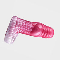 A soft silicone cock sleeve in the style of a fantasy creature.