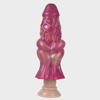 The Mutation Cock Sleeve held in hand, displaying its flexible, stretchable silicone and substantial girth enhancement.